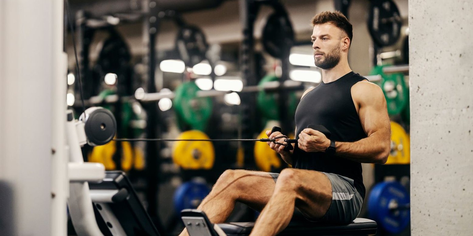 Member training on a seated row machine